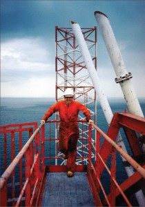 SF-Monarch-1994 copy_fmt Frank Springett atop the derrick of the Santa Fe Monarch during summer 1994.