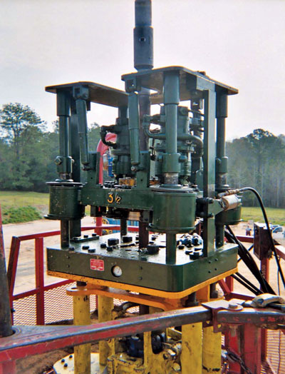  Figure 2: One model of the snubbing tong is jack-mounted. 