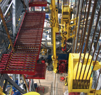 NOV’s column rackers, like this one on Thunderhorse, help to make pipe-handling operations more efficient and improve safety around the well center and drill floor. 