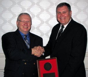 IADC president Dr. Lee Hunt (left) with Jim Gormanson, Director of Compliance, Noble Drilling Services Inc. (right).