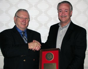 IADC president Dr. Lee Hunt (left) with William P. “Bill” Hedrick, Vice President Claims Management & Special Projects, Rowan Companies (right).