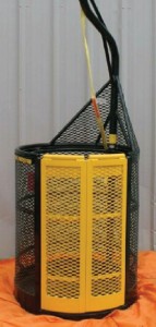 The DB-1 system features a cone-shaped aluminum basket weighing 105 lbs that is attached to an air tugger, a lifting device designed for light loads, at a single-point hookup. The basket provides outer protection for the worker and allows the tools to move with the worker.