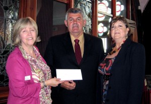Glenn White, IADC North Sea Chapter chairman, presents a 4,400 check to CLAN chief executive Debbie Thomson (left). Mr White and Val Hood (right), NSC office administrator, were invited to CLAN’s Aberdeen center so they could see for themselves how IADC’s donation will make a difference.
