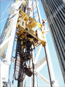 Figure 3: During drilling operations, the top drive ergonomically reduces the number of manual connections needed. Courtesy of National Oilwell Varco