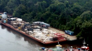 Five to six barges transported drilling rigs from Port of Belem in north Brazil to the operations base camp on the Amazon River in about three to four weeks. The camp served as a storage place for spare parts and fuel.
