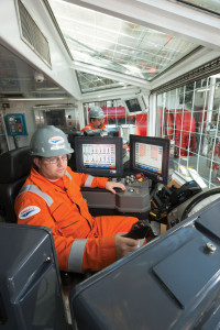 A driller works in his cabin on the ENSCO 8506. Ensco sends two-man teams offshore to audit its safety management system, making sure its permit-to-work system, energy isolation procedures and documentation are being followed.