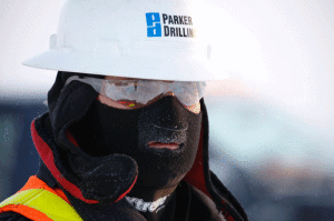 One of Parker Drilling’s senior rig managers wears protective apparel during a rig move in -40°F conditions. 