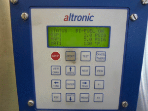 An Altronic display panel for the bi-fuel kit on a Precision Drilling rig confirms the system is operating. GSP1 is incoming gas pressure, MAP1 is the manifold absolute pressure (engine manifold pressure), and MAT1 is the manifold absolute temperature (engine manifold temperature).