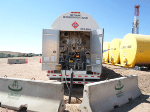 An LNG supply truck is tied into the rig supply line for a Precision Drilling dual-fuel rig.