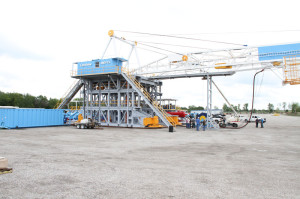 Latshaw Drilling’s Rig 19 features hydraulic “walking feet” (in yellow) on the substructure to allow the rig to walk for multiwell pad drilling.