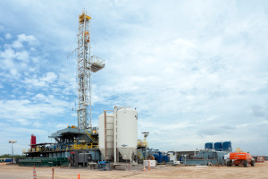 Flex Rig 507 drills for BHP Billiton in the Eagle Ford in June 2015. The rig is equipped with distributed temperature sensing and distributed acoustic sensing fiber optic cables that allow for more streamlined measurements during the drilling process.